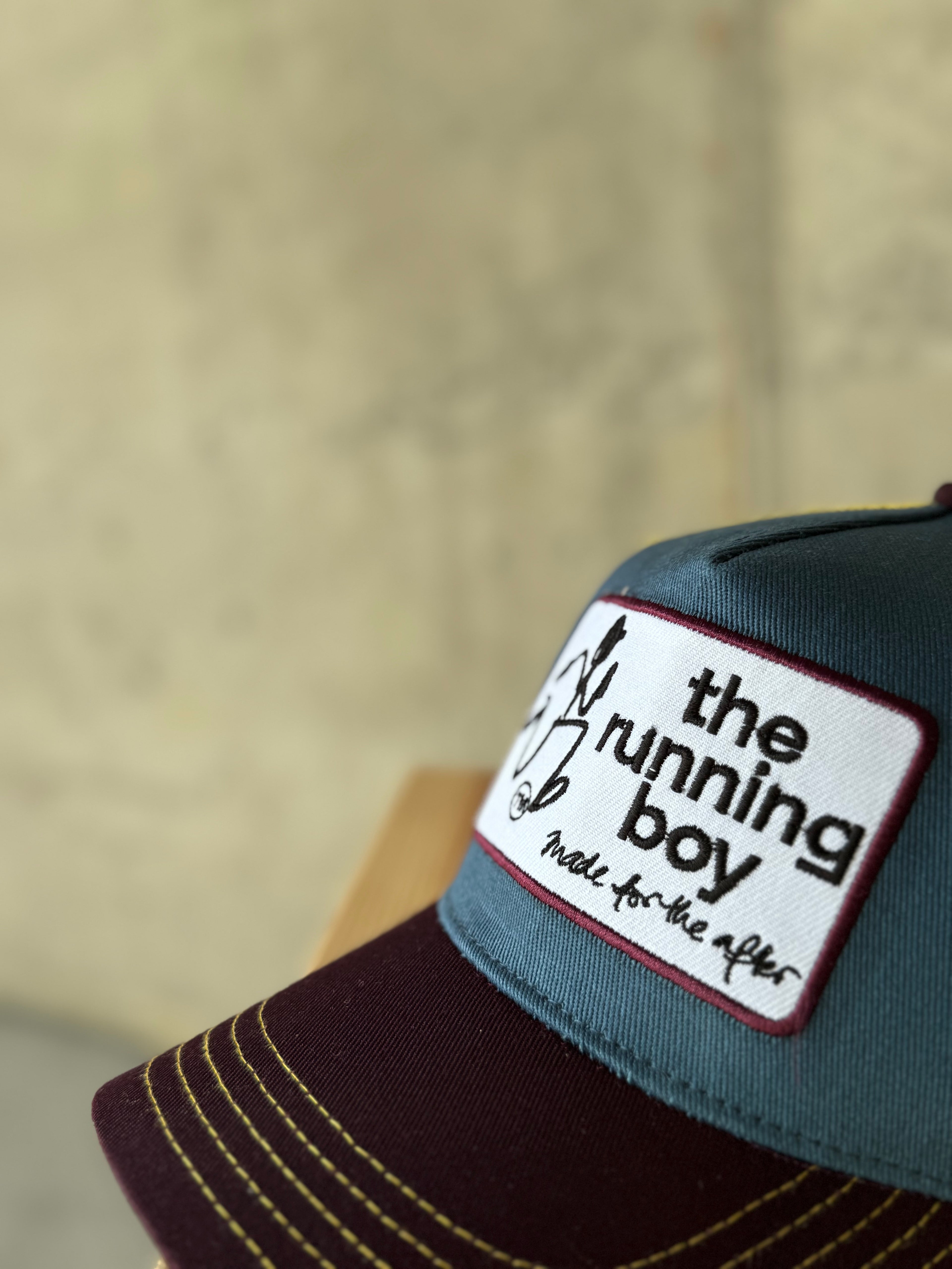 the running boy Trucker Hat. The First One. It's a littel BIG!